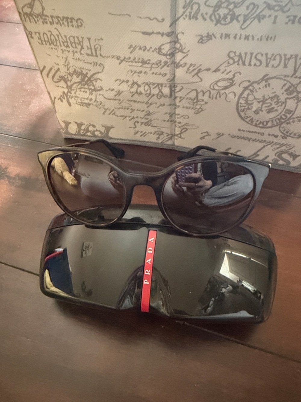 Prada Black Cat-Eye Sunglasses with Dark Lenses
